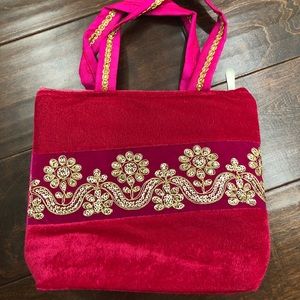 Embroidered pink bag